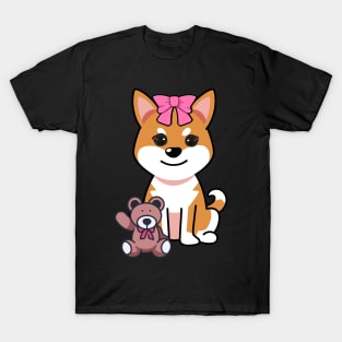 Funny orange dog is holding a teddy bear T-Shirt